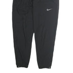 NIKE Mens Joggers Black M W28 L26 Slim Tapered Reflective Swoosh Logo