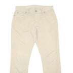 TOMMY HILFIGER Mens Jeans Beige Slim Straight Denim W34 L32 Cotton Blend Zip