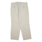 DOCKERS Mens Regular Beige Cotton Blend Trousers W34 L30 Zip Closure Casual