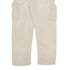 CARHARTT Mens Beige Relaxed Cargo Zip Trousers W34 L31 Durable Cotton Blend