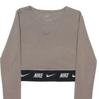 NIKE Womens Beige Crop T-Shirt S Long Sleeve Crew Neck Logo Band