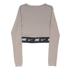NIKE Womens Beige Crop T-Shirt S Long Sleeve Crew Neck Logo Band