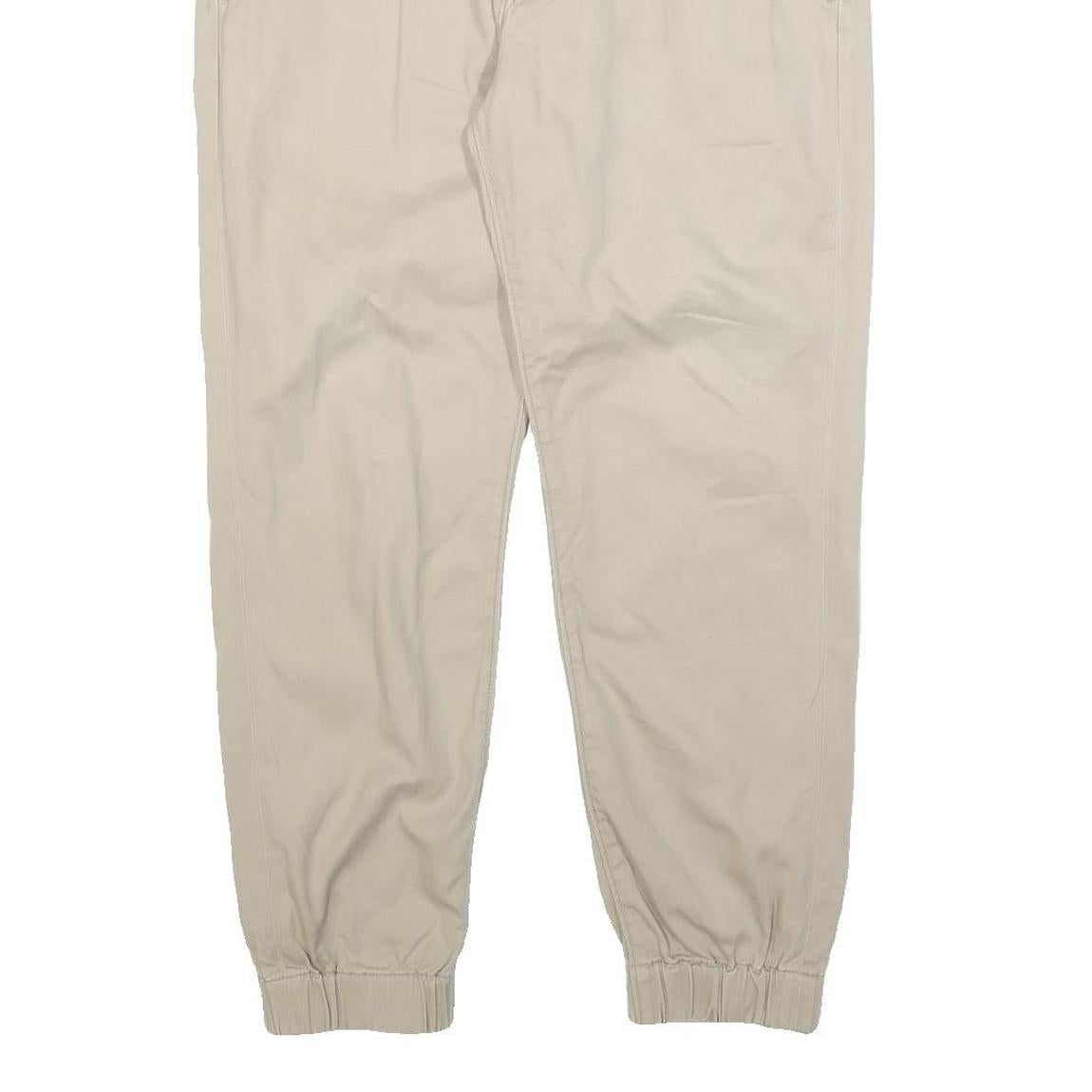 LEVI'S Mens Cotton Blend Beige Slim Tapered Trousers W34 L26 Elasticated Hem