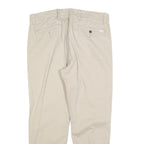 LEVI'S Mens Cotton Blend Beige Slim Tapered Trousers W34 L26 Elasticated Hem